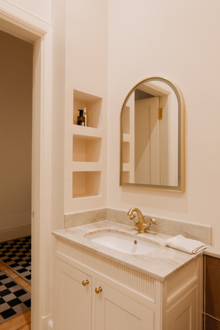 Elegant bathroom with marble countertop.