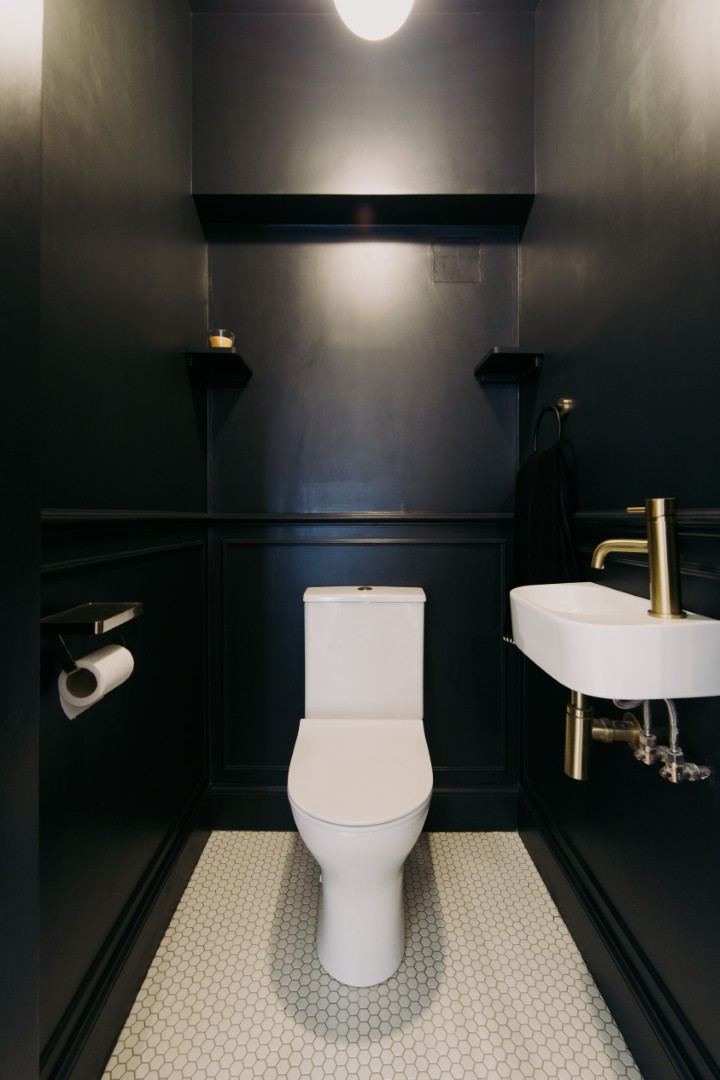 Modern black bathroom with minimalist design.