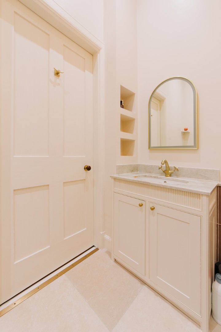 Elegant bathroom with marble countertop.